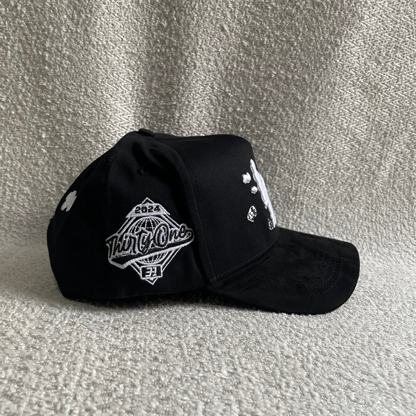 31 Hats LA monet clouds black